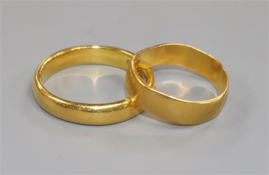 Two 22ct gold wedding bands, 11g approx.